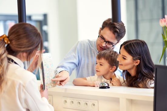 picture-of-family-checking-in-hotel-2022-01-04-01-20-21-utc-small